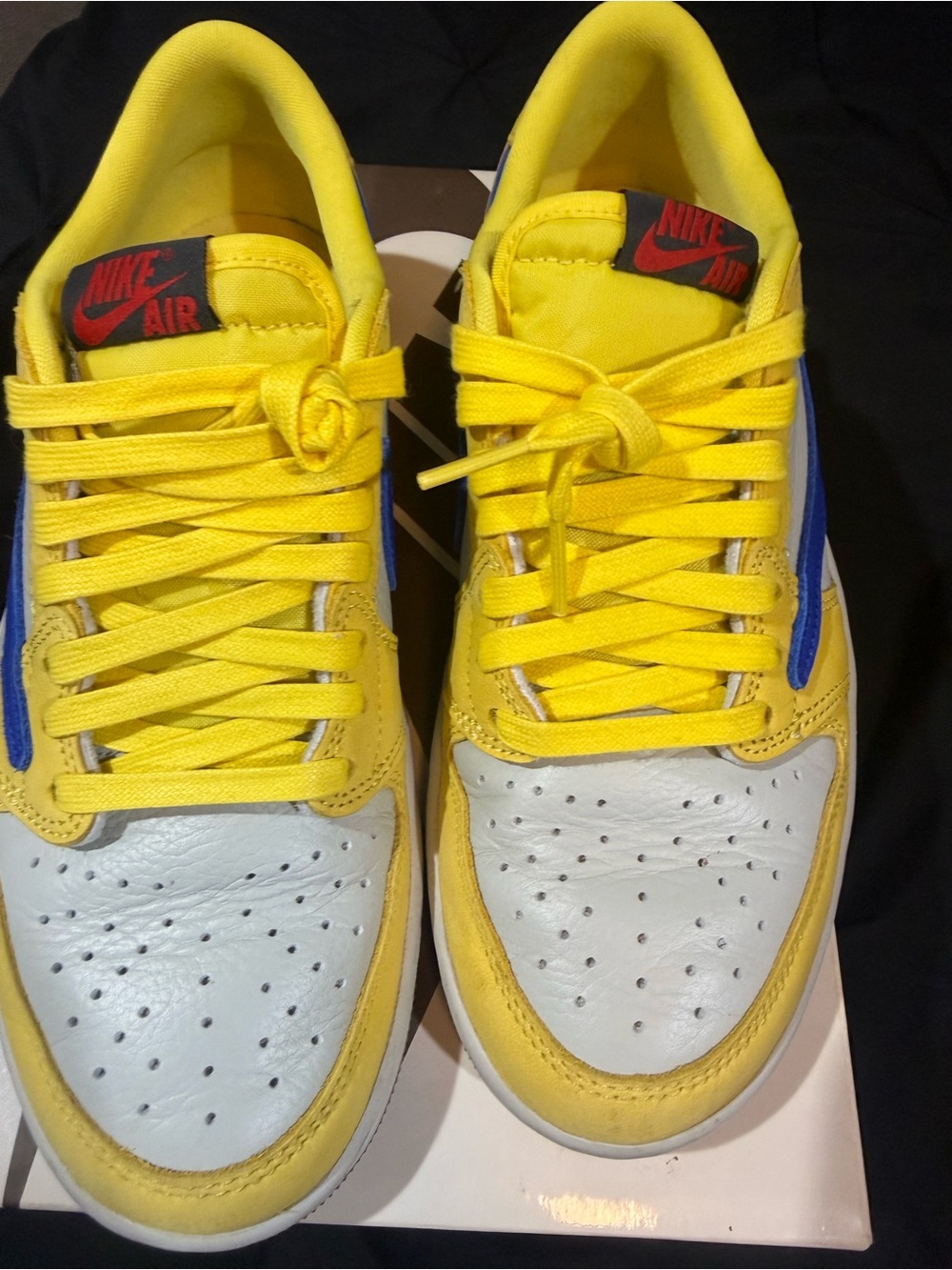 Womenโs Air Jordan 1 Low x Travis Scott Canary